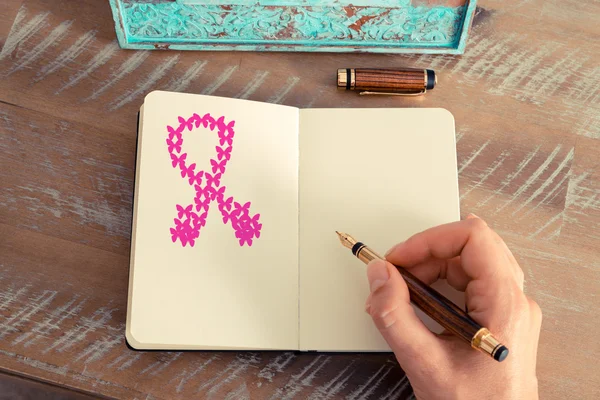 Pink ribbon as breast cancer awareness symbol — Stock Photo, Image
