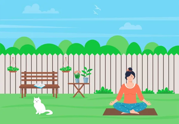 Young woman meditating in nature.  Female character is sitting in the lotus position. Woman doing yoga in the backyard of the house. Concept meditation, relax, recreation, healthy lifestyle.