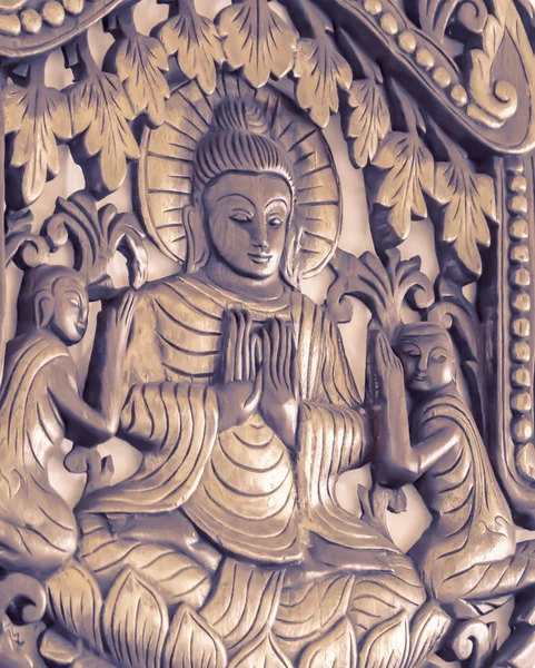 Měkká a rozmazaný zaměření Buddha zdi dřeva vyřezat (detail — Stock fotografie
