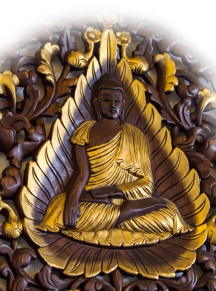 Foco suave e embaçado Buda parede escultura de madeira (close-up — Fotografia de Stock