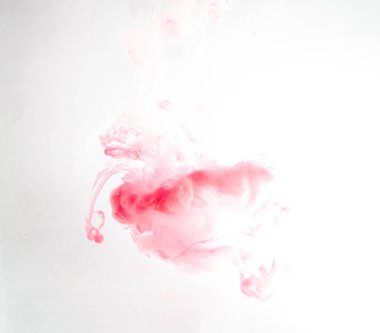 Hareket rengi suya düşer, mürekkep kıvrılır, mürekkep soyutlanır. Suyun altında süslü bir mürekkep bulutu. Kristal renkler ve suda mürekkep. Soyut arkaplan