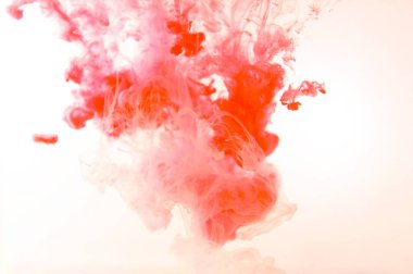 Hareket rengi suya düşer, mürekkep kıvrılır, mürekkep soyutlanır. Suyun altında süslü bir mürekkep bulutu. Kristal renkler ve suda mürekkep. Soyut arkaplan