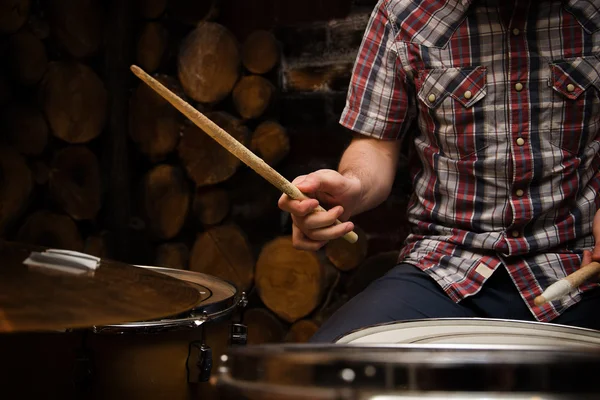 Drummer with sticks and drums — Stock Photo, Image