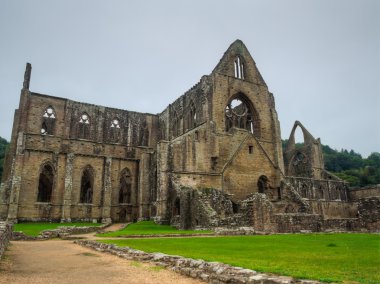Ruins of Tintern Abbey, a former church in Wales clipart