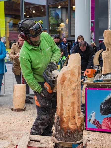 Wood carving artist at work — Stock Photo, Image