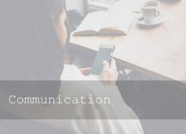 Woman sits in a cafe with a cup of coffee, tea. Read a book and dream. Looking at mobile phone. Wait for somebody