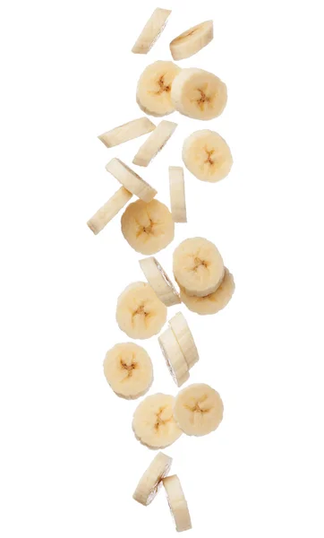 Rodajas de plátano cayendo aisladas sobre fondo blanco — Foto de Stock