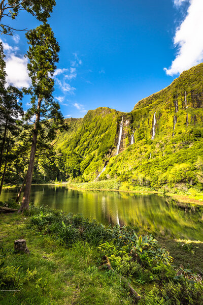 Azores landscape with waterfalls and cliffs in Flores island. Po