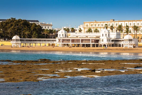 Old bathhouse on the beach of 'La Caleta', one of the most famou — Stock Photo, Image