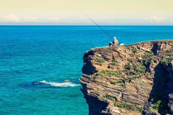 Fisherman on the rocks,Ribadeo, Spain — Stock Photo, Image