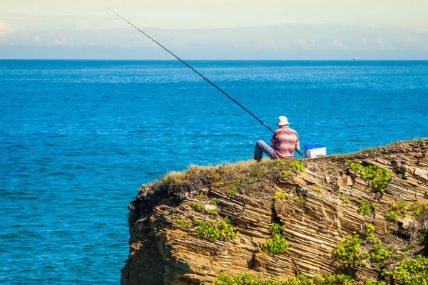 Fisherman on the rocks,Ribadeo, Spain — Stock Photo, Image