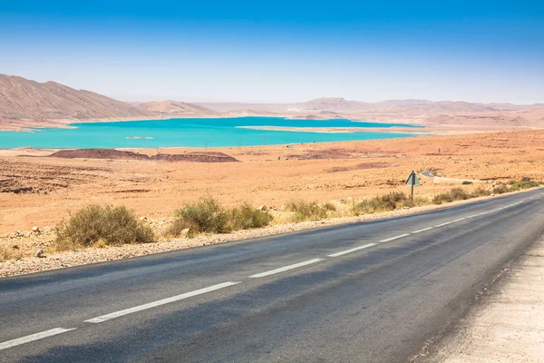 Endless road in Sahara Desert with blue sky,Morocco Africa — Stock Photo, Image