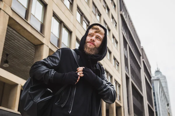 Stylish bearded man posing in the street — Stock Photo, Image