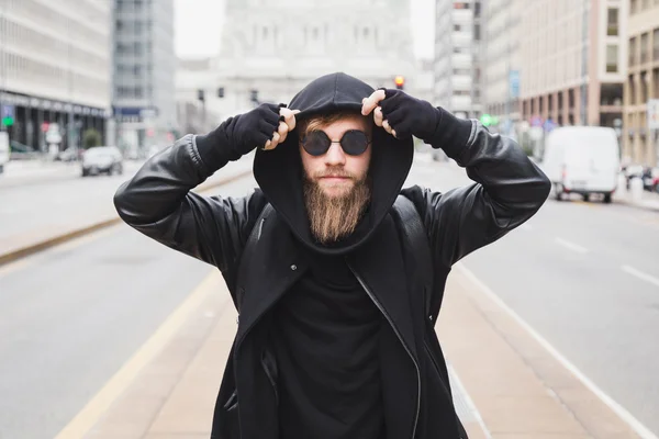 Stylish bearded man posing in the street — Stock Photo, Image