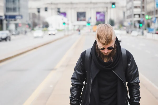 Stylish bearded man posing in the street — Stock Photo, Image