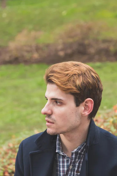 Young man posing in the city streets — Stock Photo, Image