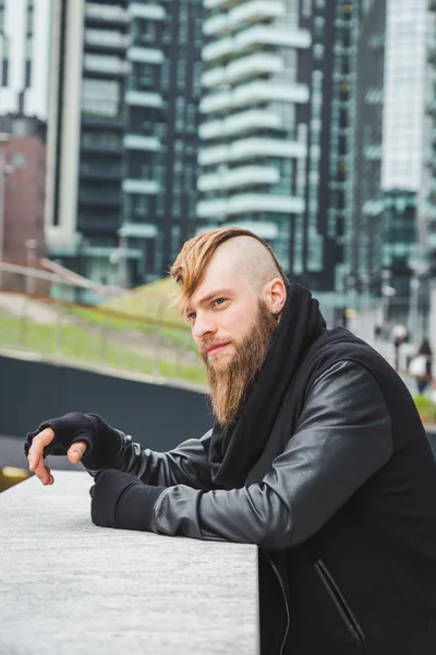 Stylish bearded man posing in the street — Stock Photo, Image