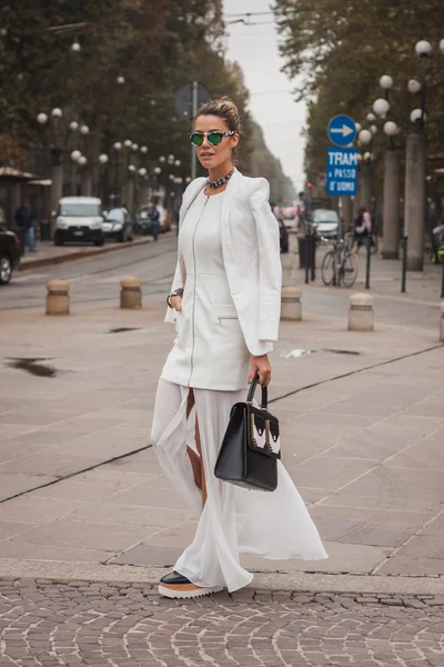 Woman outside Cavalli fashion shows building for Milan Women's Fashion Week 2014 — Stock Photo, Image