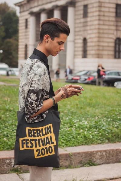 Man outside Cavalli fashion shows building for Milan Women's Fashion Week 2014 — Stock Photo, Image