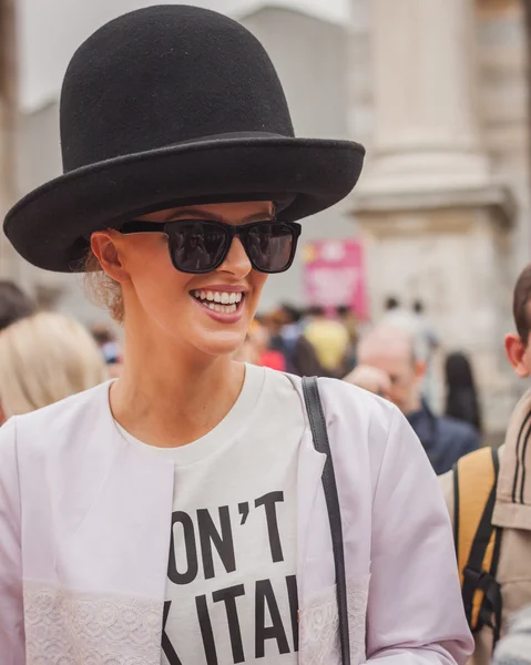 Woman outside Cavalli fashion shows building for Milan Women's Fashion Week 2014 — Stock Photo, Image