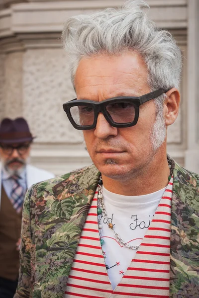 Man outside Ferragamo fashion shows building for Milan Women's Fashion Week 2014 — Stock Photo, Image