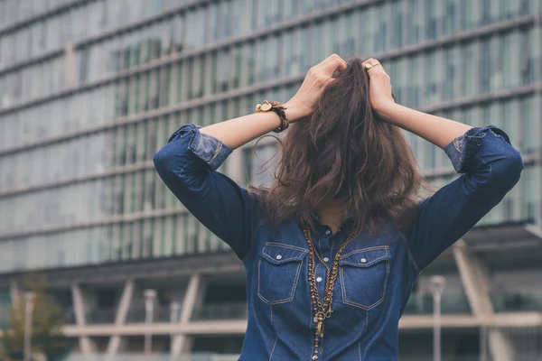 Pretty girl hiding face with her hair — Stock Photo, Image