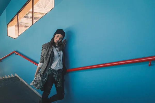 Pretty girl posing in a metro station — Stock Photo, Image