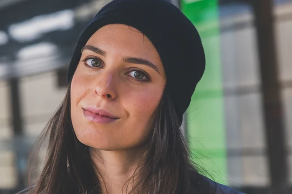 Pretty girl posing in a metro station — Stock Photo, Image