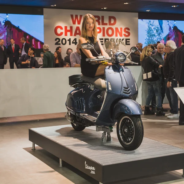 Vespa scooter on display at EICMA 2014 in Milan, Italy — Stock Photo, Image