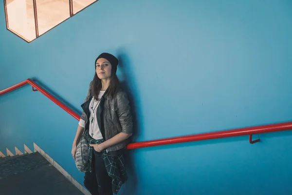 Pretty girl posing in a metro station — Stock Photo, Image