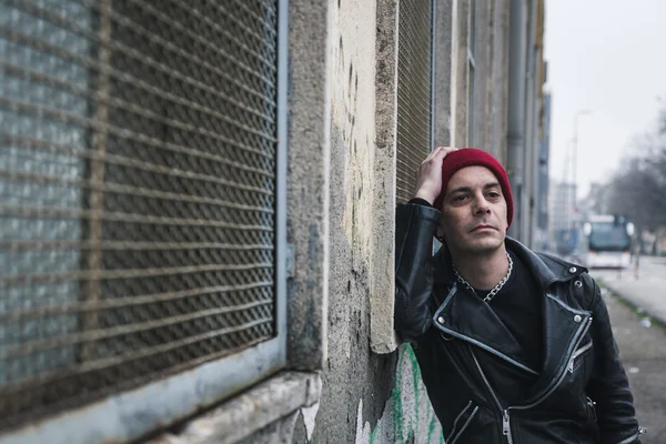 Punk guy posing in the city streets — Stock Photo, Image