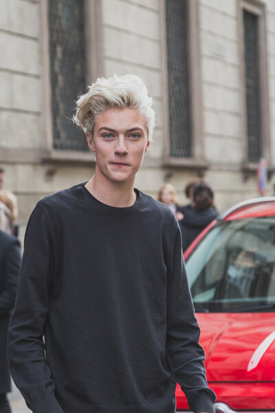 Model Lucky Blue Smith poses outside Cavalli fashion show building for Milan Men 's Fashion Week 2015
