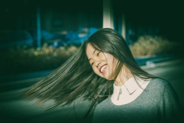 Intentionally blurred portrait of a young beautiful Chinese girl — Stock Photo, Image