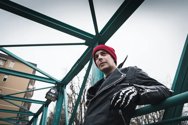 Punk guy posing in the city streets — Stock Photo, Image