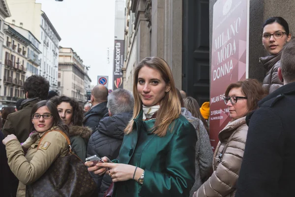 People outside Trussardi fashion show building for Milan Women's