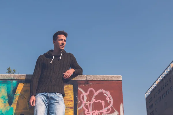 Young  man posing in an urban context — Stock Photo, Image