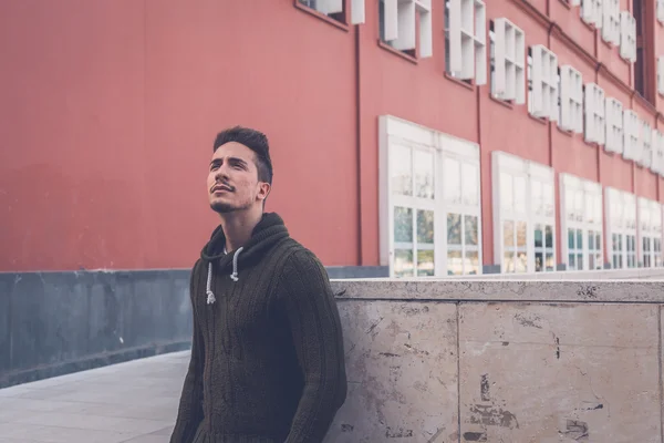 Young  man posing in an urban context — Stock Photo, Image