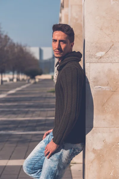 Young  man posing in an urban context — Stock Photo, Image