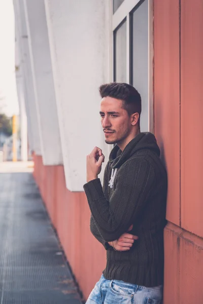 Young  man posing in an urban context — Stock Photo, Image