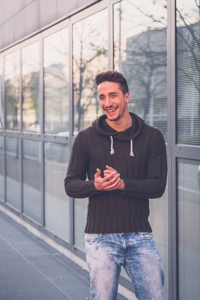 Young  man posing in an urban context — Stock Photo, Image