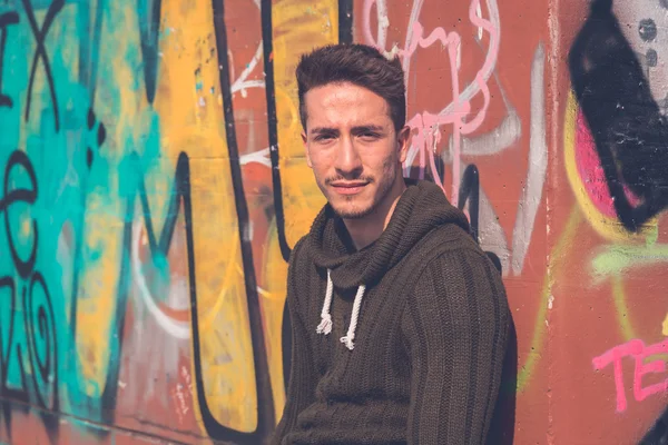 Young  man posing in an urban context — Stock Photo, Image