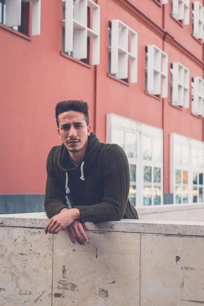 Young  man posing in an urban context — Stock Photo, Image