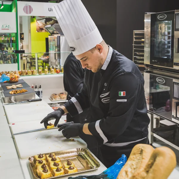 Cook at Tuttofood 2015 in Milan, Italy