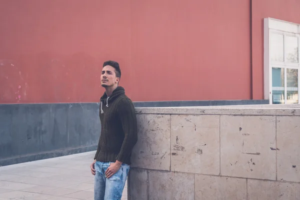 Young  man posing in an urban context — Stock Photo, Image