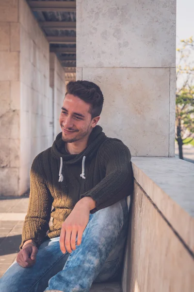 Young  man posing in an urban context — Stock Photo, Image