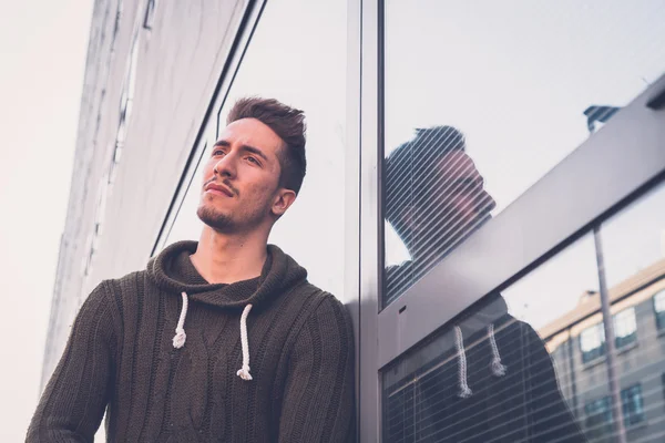 Young  man posing in an urban context — Stock Photo, Image