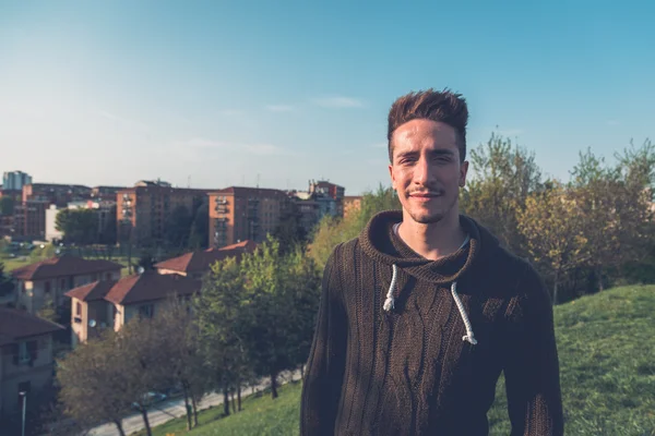 Young  man posing in an urban context — Stock Photo, Image