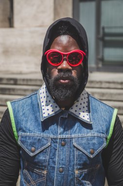 People outside Ferragamo fashion show building for Milan Men's F
