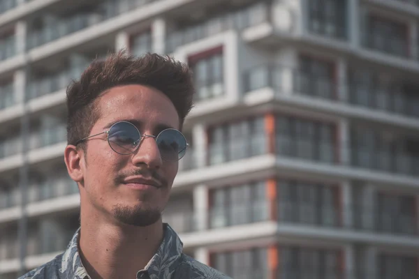 Young handsome man posing in the street — Stock Photo, Image