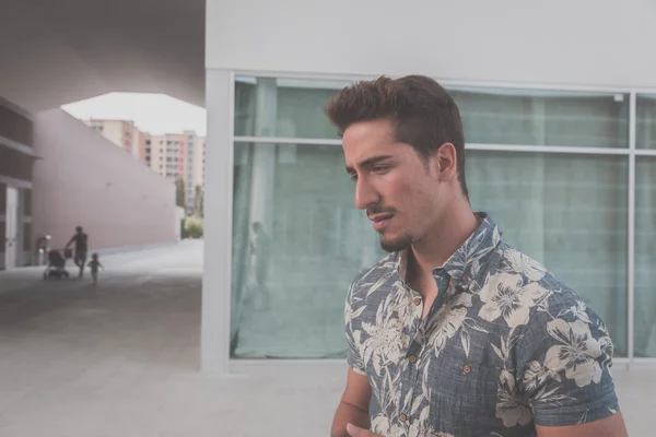 Young handsome man posing in the street — Stock Photo, Image